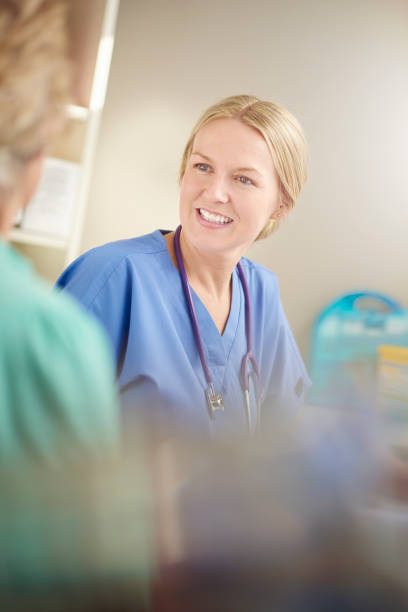 istock happy doctor and patient 681695046