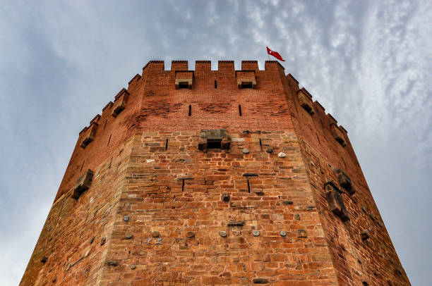 istock Red tower (Kizil Kule) in Alanya on a cloudy day 681702354