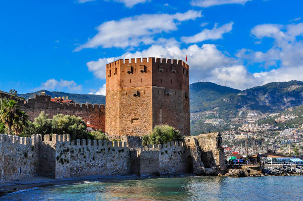 istock Red tower (Kizil Kule) in Alanya on a cloudy day 681702444