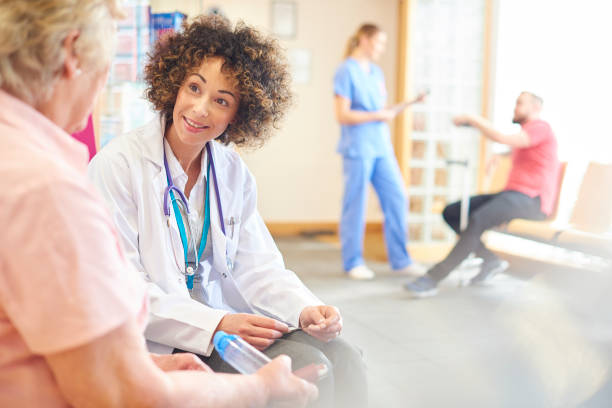 istock Doctor explaining inhaler procedure to senior patient 681714174