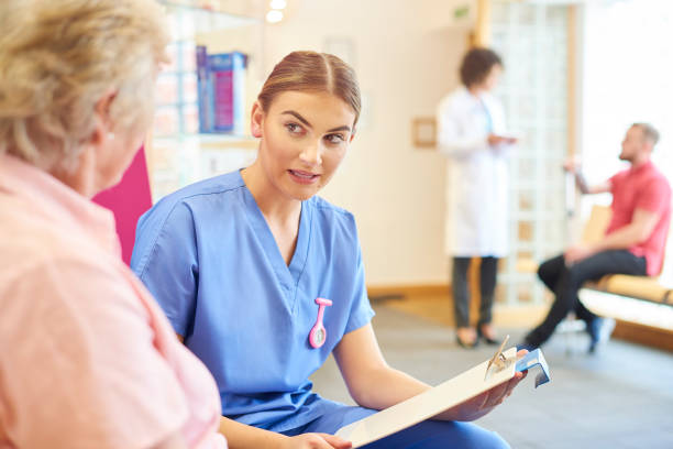 istock Female nurse explaining medication to senior patient 681718996