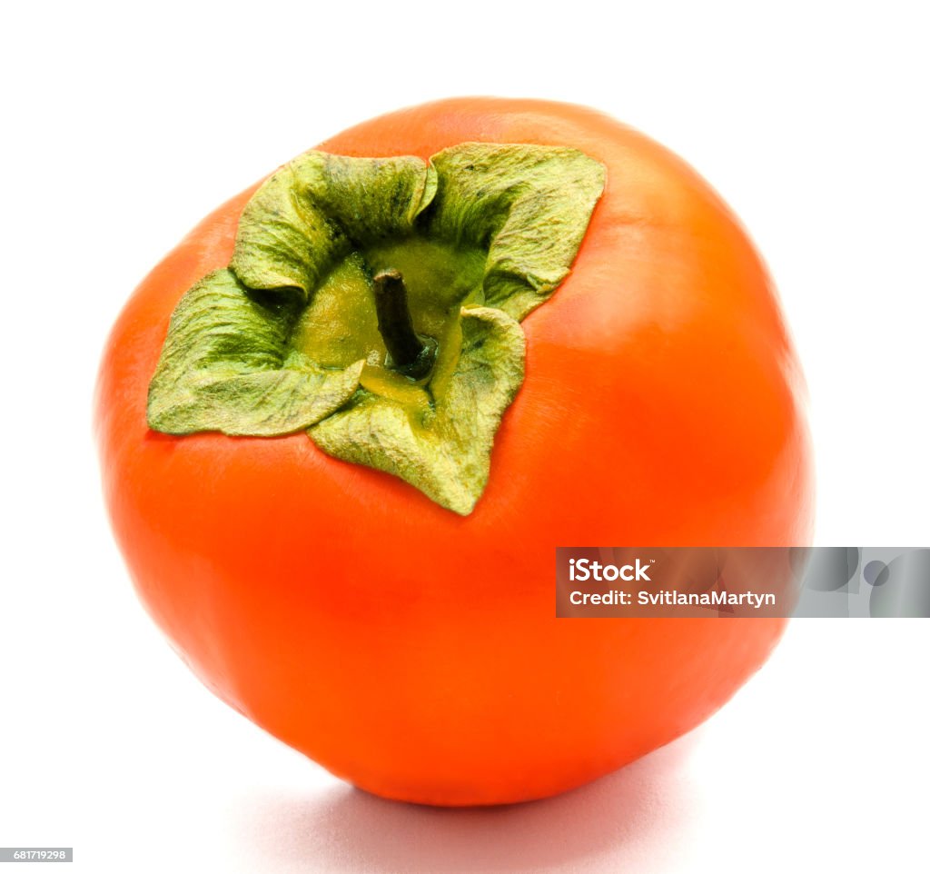 Orange ripe persimmon isolated Orange ripe persimmon isolated on a white background Cut Out Stock Photo