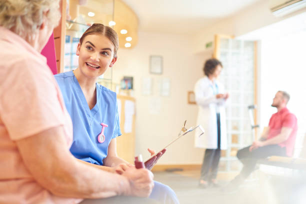 istock Female nurse putting senior patient at ease 681719400
