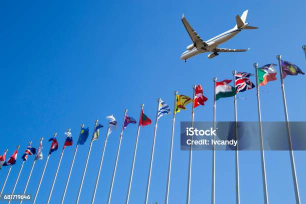 Airplane Flyover The National Flags Stock Photo - Download Image Now - Global Communications, Global, Global Business