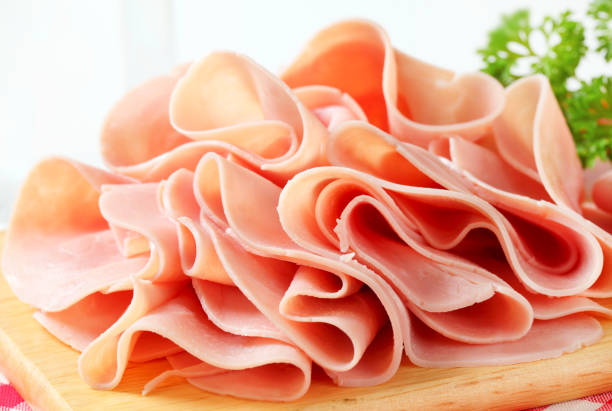 Thinly sliced ham stock photo
