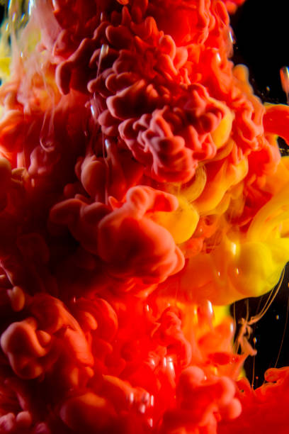 istock red ink in water isolated on black background 681723032