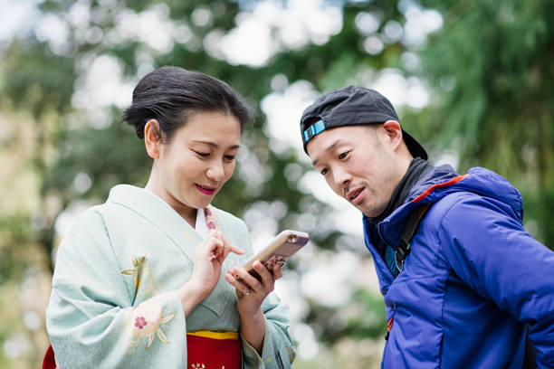 istock Asian couple having fun in the park 681723304