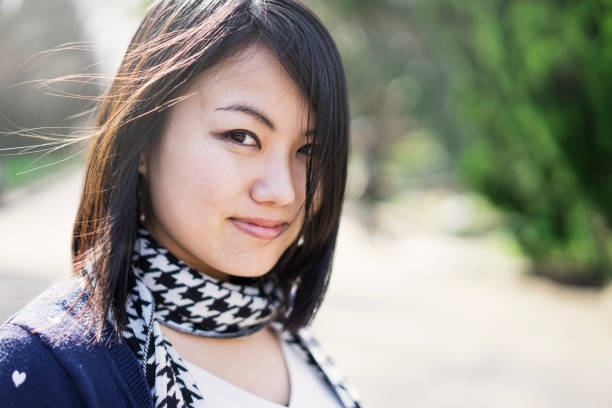 istock Asian young woman having fun in the park 681723352