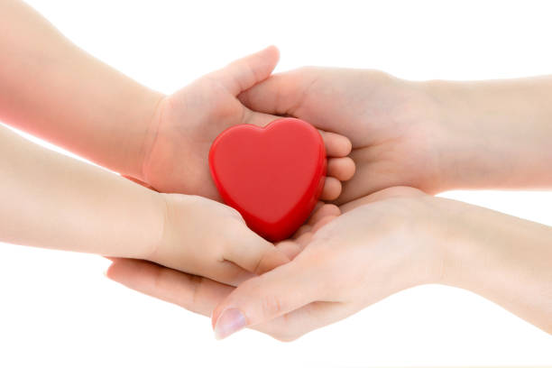 istock Mother's hands give heart to child 681727610