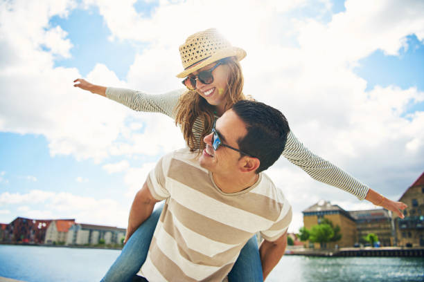 istock Happy young couple enjoying the summer sun 681727704