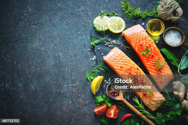 Fresh Salmon Fillet With Aromatic Herbs Spices And Vegetables Stock Photo - Download Image Now