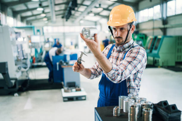 istock modern industrial machine operator working in factory 681732790