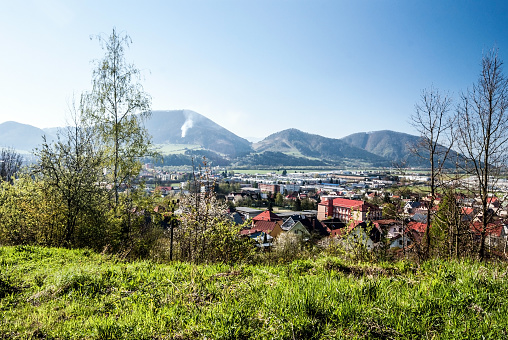 Kysucke Nove Mesto city with hills on the background and clear sky in Slovakia during nice spring day
