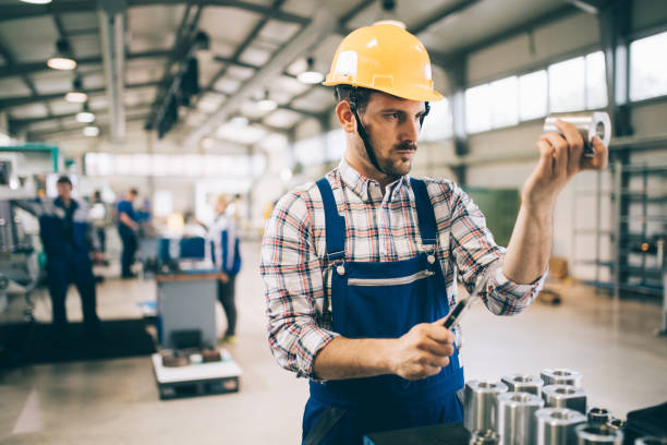 istock modern industrial machine operator working in factory 681732812