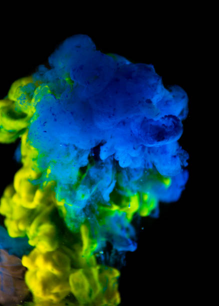 istock Acrylic colors and ink in water. Abstract frame background. Isolated on black 681733898