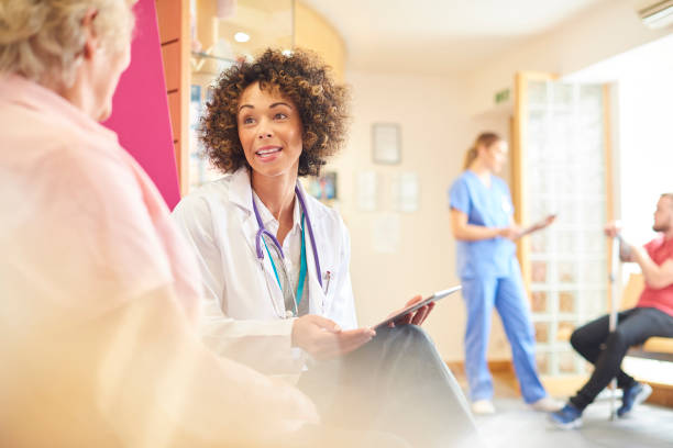 istock Female doctor taking a few details from patient 681735336