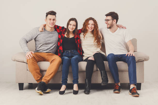 istock Party with friends, young people sitting on couch 681740334