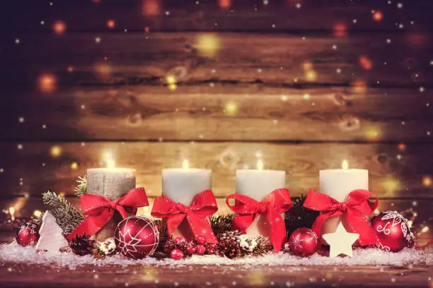 Advent decoration with four burning candles. Christmas background