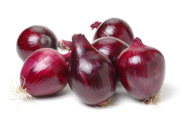 istock Red onion with the outer peel removed on white background 681747818
