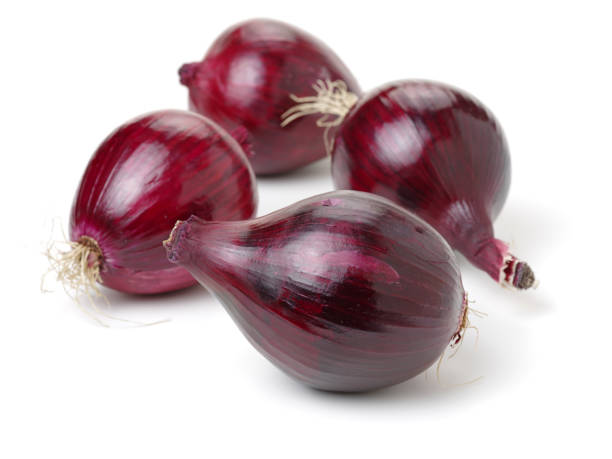 istock Red onion with the outer peel removed on white background 681748234