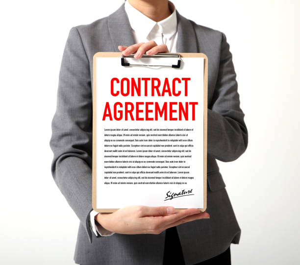 istock woman showing a written contract agreement 681766046