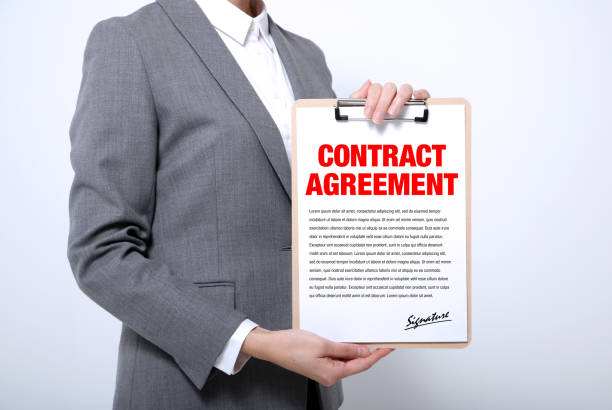 istock woman showing a written contract agreement 681766070