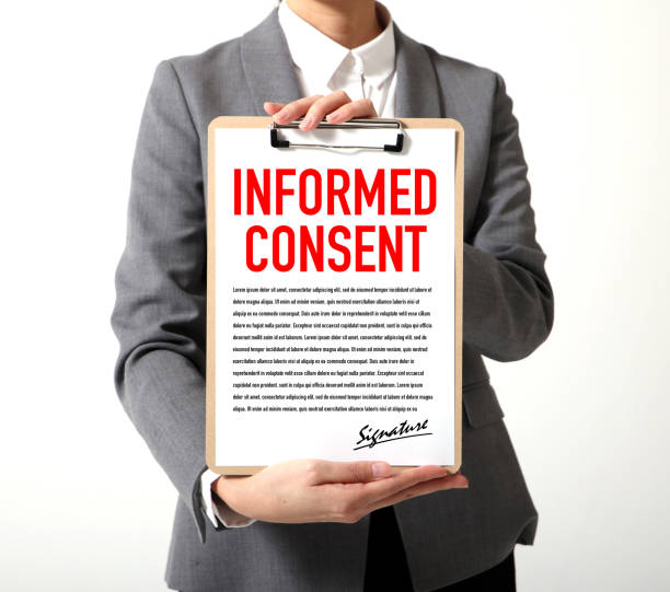 istock woman showing a written informed consent 681766146