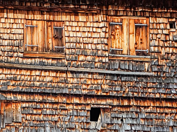 istock Windows of a wooden alpine cabin backround 681768280
