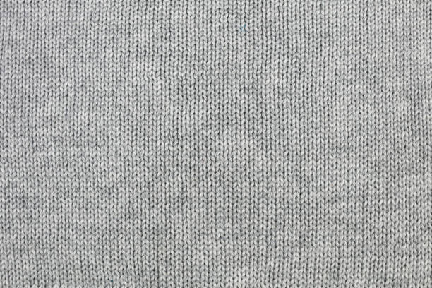 gris tricoté fond - maille photos et images de collection