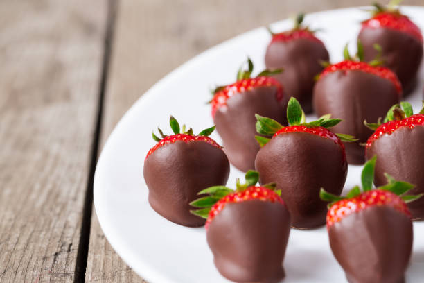 istock Fresh strawberries dipped in chocolate sauce 681781688