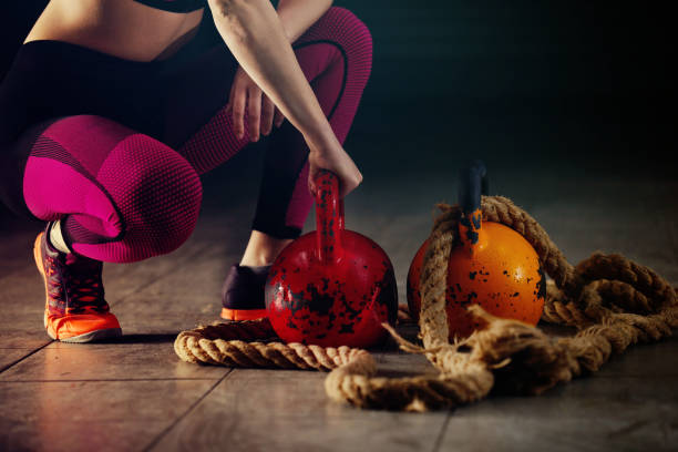 Young Woman Exercising in the gym