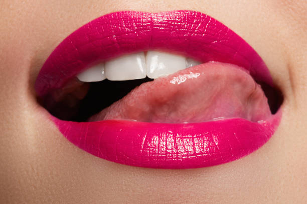 istock Beautiful full pink lips. Pink lipstick. Make-up and cosmetics 681800590