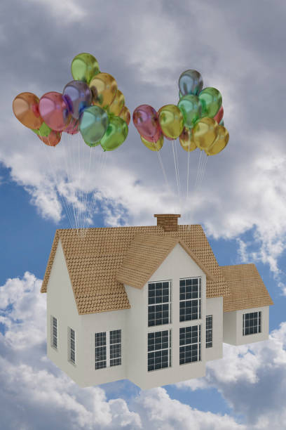 istock 3D rendering of a house flying with balloon 681810634