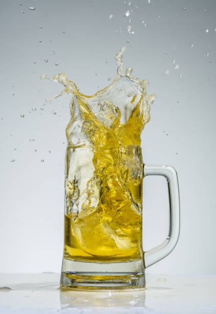 istock glass of beer splashing 681810720