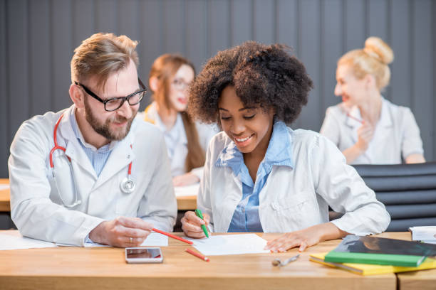 istock Group of medical students in the classroom 681811056