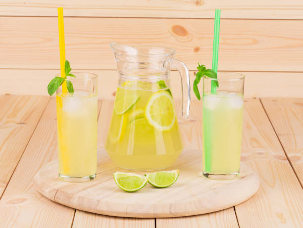 istock Pitcher and glasses full of tasty lemonade. 681820418