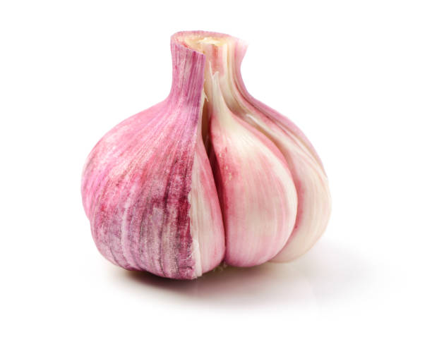 istock Garlic closeup isolated on white background. With clipping path 681820746