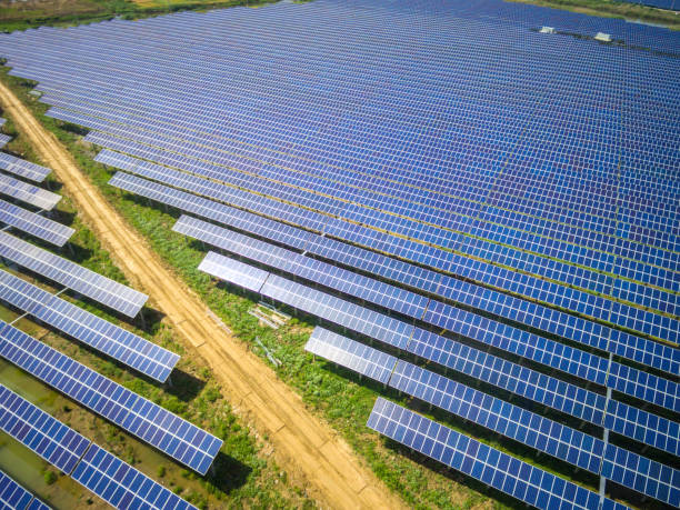 aerial view of solar power station - solar panel fotos imagens e fotografias de stock