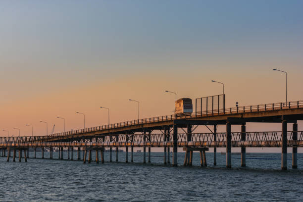 istock truck transportation bridge over water 681828306