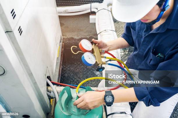 Technician Is Checking Air Conditioner Stock Photo - Download Image Now - Air Conditioner, Business, Consumerism