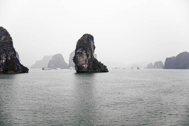 heavy raining , boat , sea ,halong, vietnam
