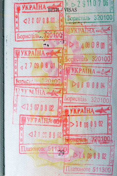 istock Passport page with Ukrainian entry and exit stamps 681839224
