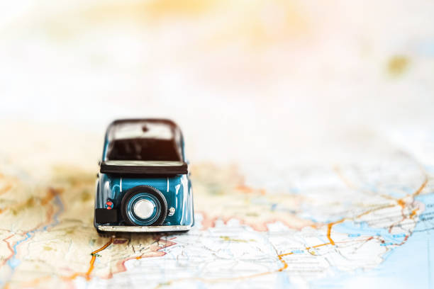 istock Toy retro car on the map, travel concept 681840130