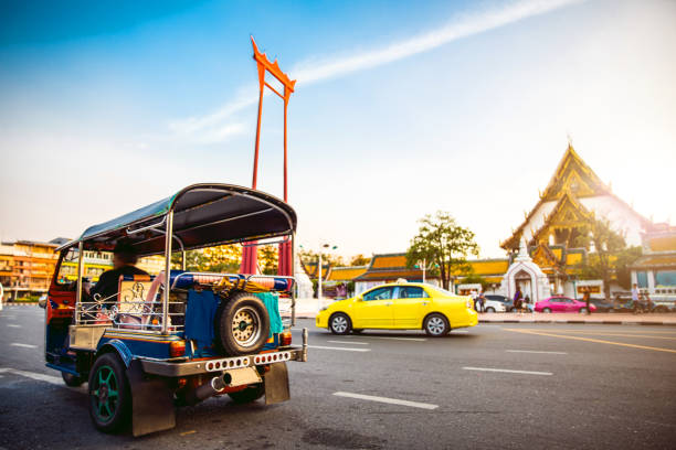 Bangkok traffic in front of Giant Swing, Thailand.