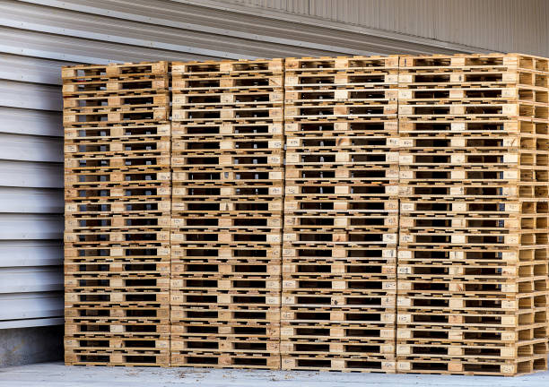 istock Stack of wooden pallets in the factory. 681857812
