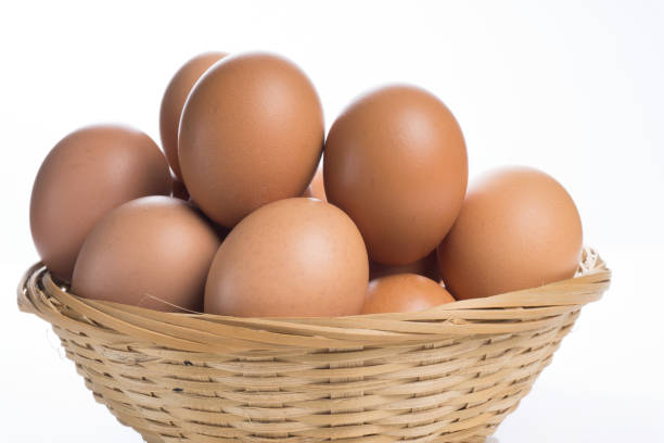 istock Eggs in the basket isolated on white background. 681860356