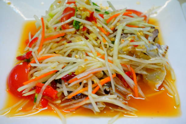 istock Delicious papaya salad on dish 681868210