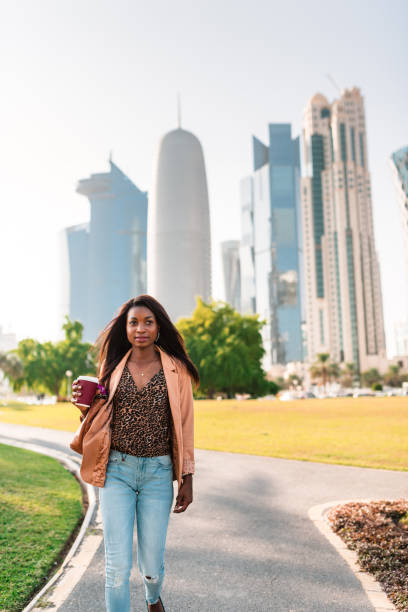 istock tourist in the doha la corniche park walking 681874872