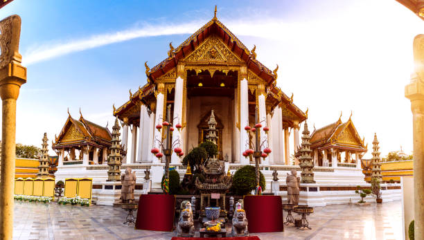 istock Bangkok Thai temples Wat Suthat at sunset with a beautiful sunlight 681876768