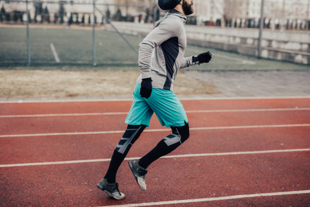 istock A person sprinting on the running track 681882702